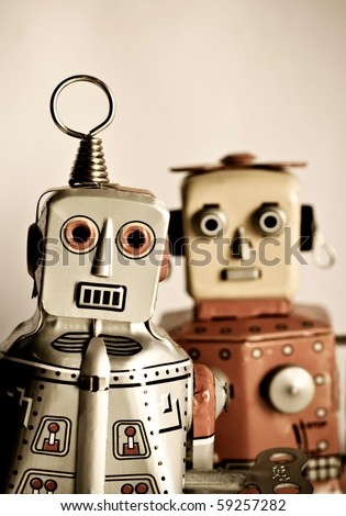 two retro robot toys