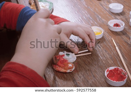 brush for painting in child hand draw