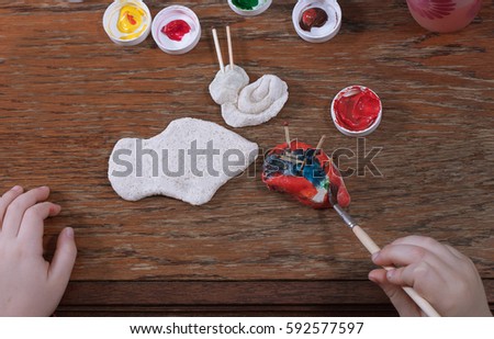 brush for painting in child hand draw