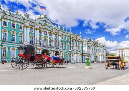horse-drawn carriages on the Palace Square in St. Petersburg Royalty-Free Stock Photo #592595759