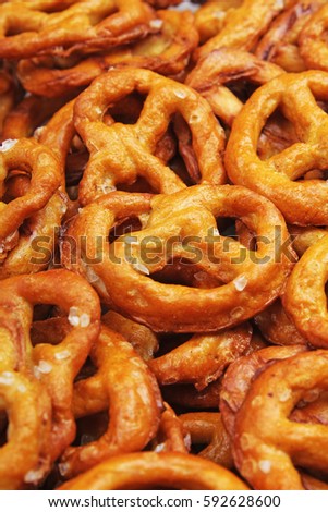 Pretzel shaped bread sticks cracker texture pattern. Salted pretzels