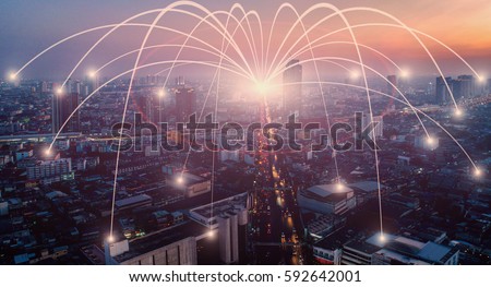Business networking connection concept and Wi-Fi in city. Technology communication, The wireless communication , High Speed Internet , Optical fiber , Background blur building in the capital  Royalty-Free Stock Photo #592642001