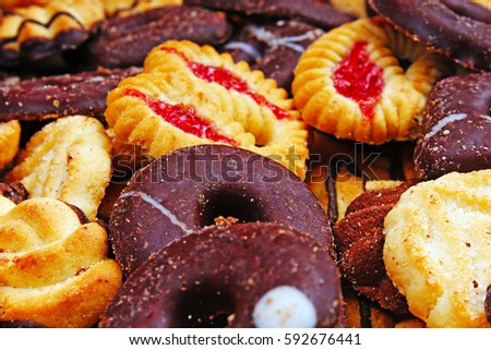 Cookies. Cookie crumpet tea biscuit pattern. Crumpets as background. Biscuits crumpet pattern texture. Chocolate coated biscuits.