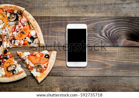 Pizza, Italian food delivery, call or order online on mobile, cellular, smart phone. Royalty-Free Stock Photo #592735718