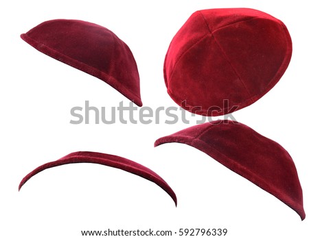 red kippa is a small hat worn by Jewish. Royalty-Free Stock Photo #592796339