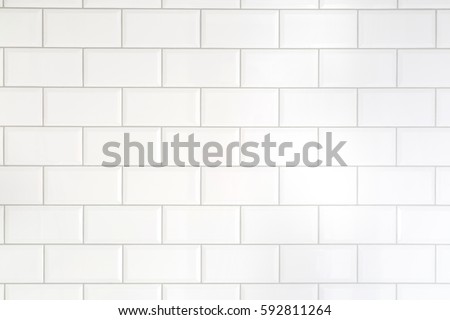 White tiles brick background Royalty-Free Stock Photo #592811264