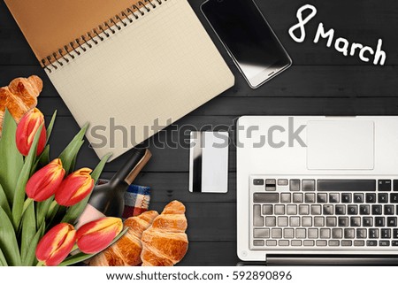 March 8, flowers, laptop, phone. Background on March 8
