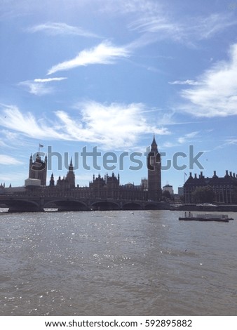 Big Ben and House of Parliament on the Thames River