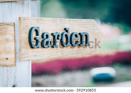 Wooden garden sign for direction