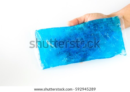 cool and hot pack gel in hand with copy space .pain relief. Royalty-Free Stock Photo #592945289