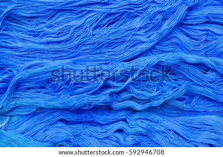 Background texture of blue cotton thread