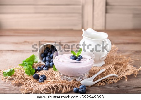 Yogurt with bilberry. Selective focus.