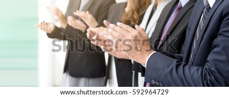 Group of business people giving an applause in the meeting, panoramic banner Royalty-Free Stock Photo #592964729