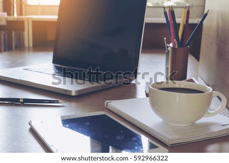 Paper and office supplies on the table wood, Working in morning time, business and finance on wood desk, thinking and analysis for success.