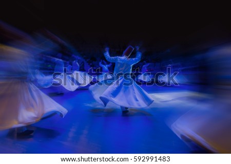 Whirling Dervish sufi religious dance Royalty-Free Stock Photo #592991483