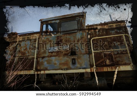 Old rusty train locomotive thrown. Exclusion zone of Chernobyl. Zone high radioactivity. Ghost town of Pripyat. Chernobyl disaster Rusty abandoned Soviet machinery in area of nuclear accident at plant