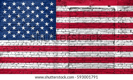 American flag on brick wall with bricked door
