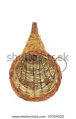 Still picture of decorative wooden basket for Thanksgiving Day and Harvest decoration orientated vertical over white background.