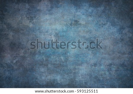 Blue painted canvas or muslin fabric cloth studio backdrop or background Royalty-Free Stock Photo #593125511