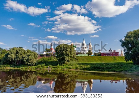 landscape temples, houses and trees on a Sunny day with clouds on the banks of the Moscow river in Kolomna, in the Moscow region