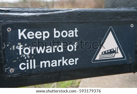 "Keep Boat Forward of Cill Marker" Sign attached to a Paddle on a Lock on the Kennet and Avon Canal At Aldermaston Wharf between Newbury and Reading, Berkshire, England, UK
