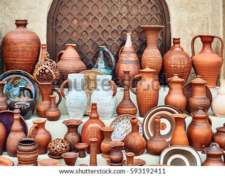 Showcase of handmade ceramic pottery in a roadside market