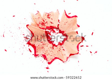 Red pencil shavings isolated on white