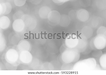 bokeh background with abstract blurred foliage and bright summer sunlight