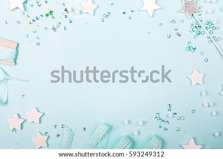 Blue Frame background with stylish decoration stars and sequins with copy space for text.  Royalty-Free Stock Photo #593249312