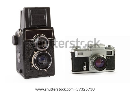 Old rangefinder and  twin-lens reflex large format film cameras isolated on white background