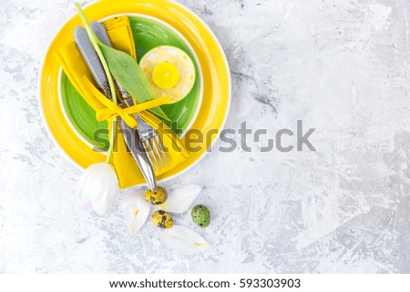 Easter Table Decoration on light Background. Festive Table Settings With Spring Flowers 