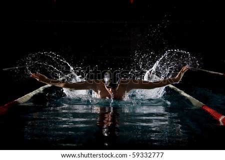 Taking breath swimming butterfly Royalty-Free Stock Photo #59332777