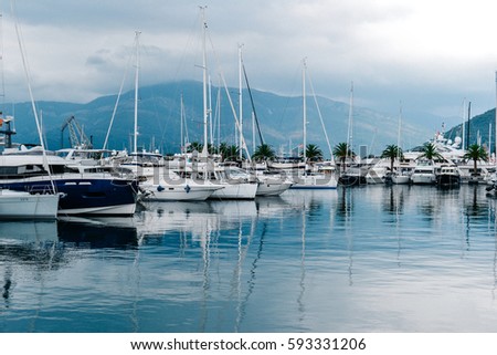 Yachts in Kotor port, Montenegro Royalty-Free Stock Photo #593331206