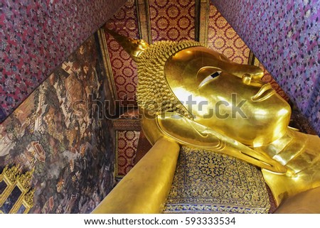 Sleeping great golden Buddha.Believe in Buddha.