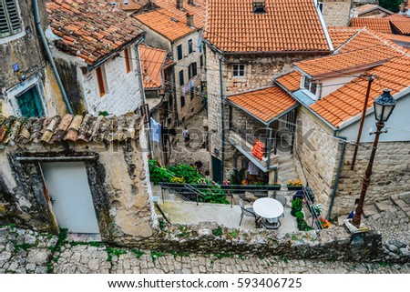 Historical streets in old town Adriatic town Kotor, Montenegro Royalty-Free Stock Photo #593406725