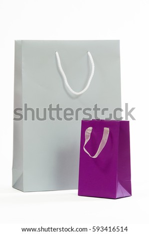 Silver and purple paper bag on a white background