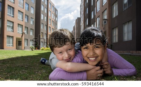 Two Young Kids happy outdoors.

