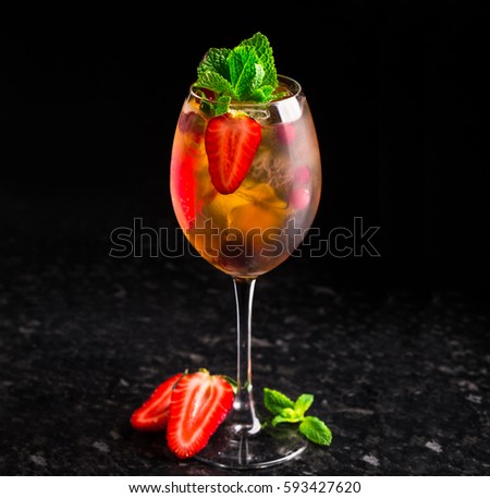Cocktail with strawberries and mint