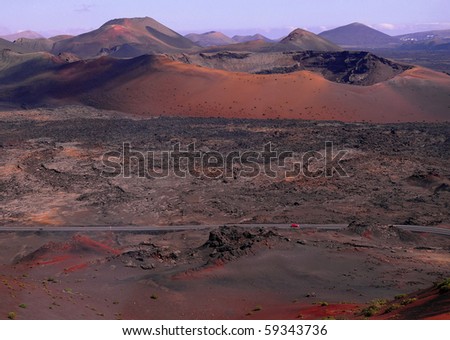 Dark landscapes of National Park Timanfaya, Lanzarote. Spanish national park in the South West of the island of Lanzarote, Canary Islands