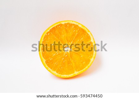 Half orange isolated on white background Royalty-Free Stock Photo #593474450