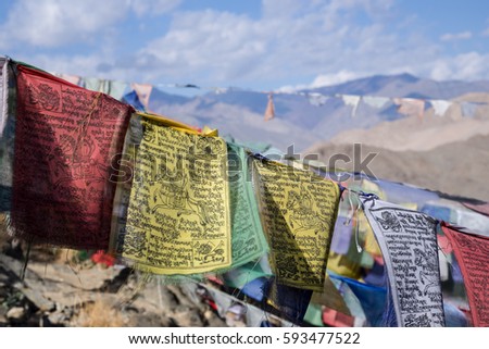 Buddhist prayer flags in the Himalaya mountains
