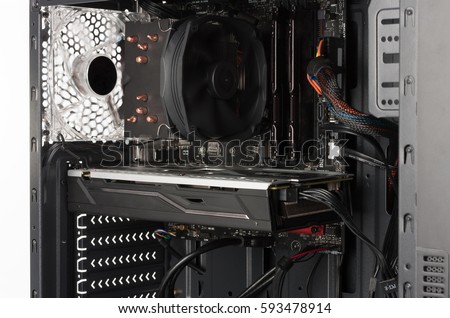 Close up view inside open midi tower computer case. Royalty-Free Stock Photo #593478914