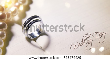 Wedding background with rings and heart shadow