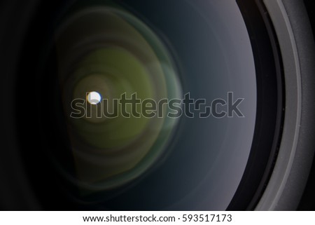 The diaphragm of a camera lens aperture.