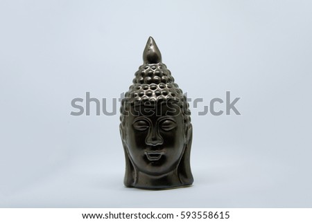 Buddha head of metal bronze, relax for bathroom, isolated on white