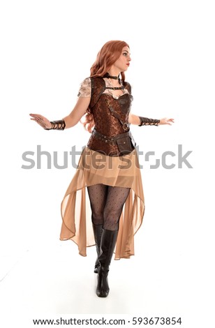 full length portrait of a beautiful girl wearing steampunk outfit, standing pose isolated on white background.
