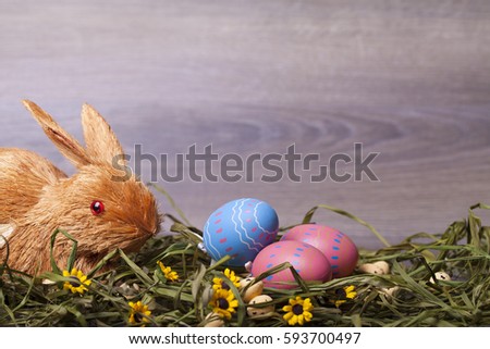 Easter decoration with eggs on a wooden background