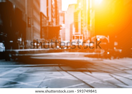 Abstract background of people on the street with sunlight
