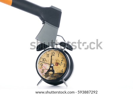 Ax breaking black alarm clock, isolated on white background with copy space.