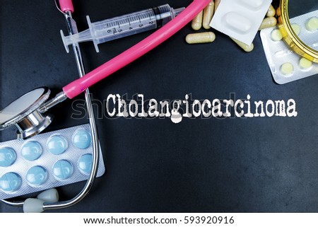Cholangiocarcinoma word, medical term word with medical concepts in blackboard and medical equipment background.